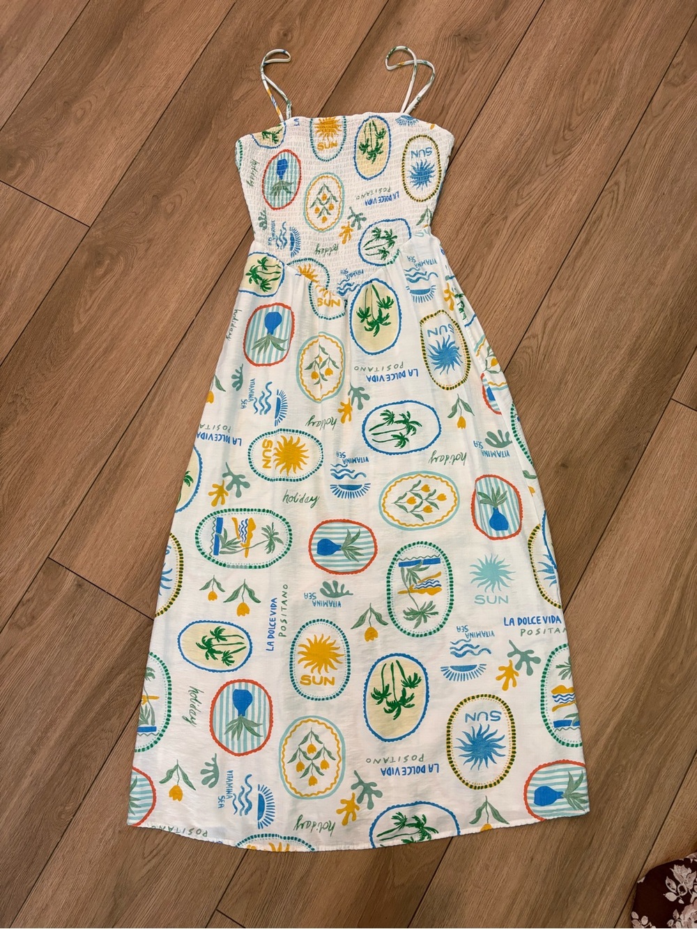 Smocked White Sundress with Colorful Sun & Palm Motif